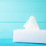 Tissue box with blue background