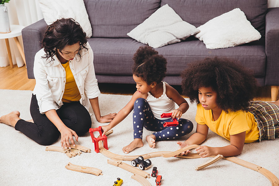 Mom and kids playing